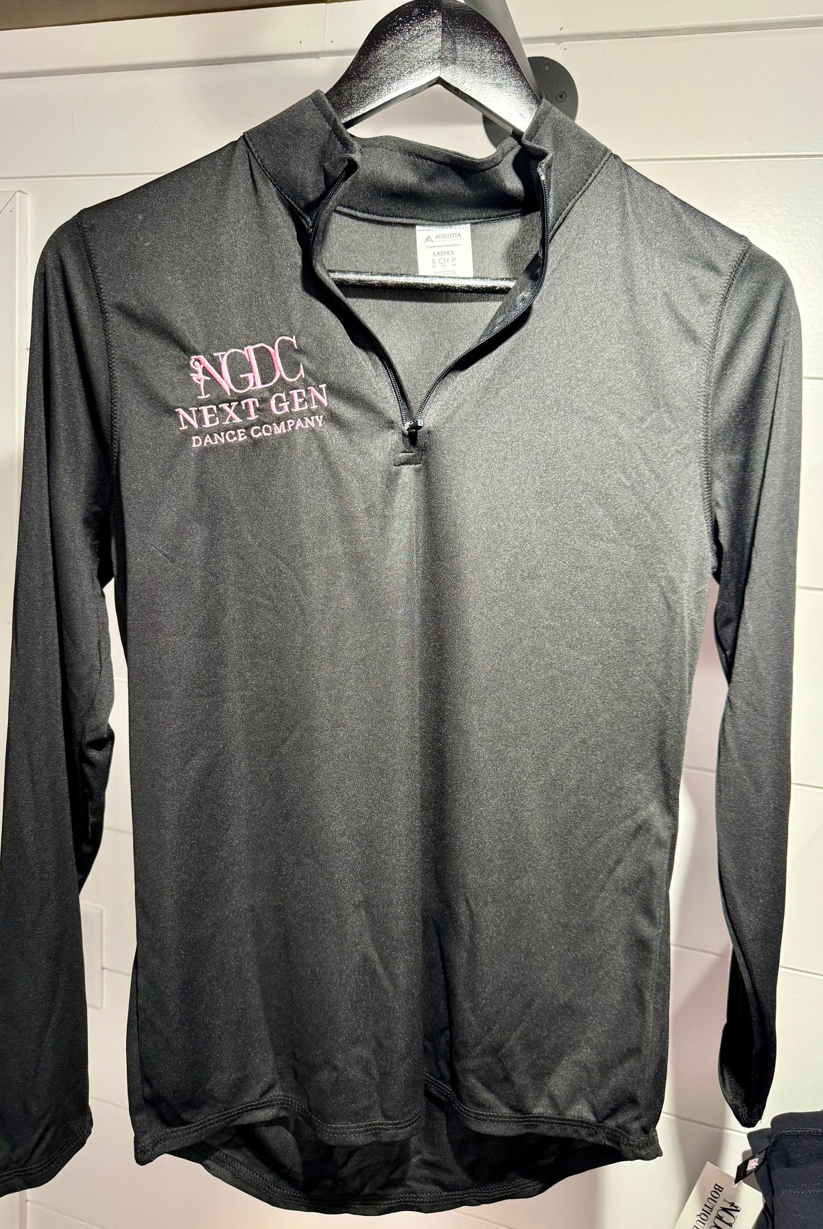 Black long sleeve quarter zip lightweight pullover with pink embroidered logo